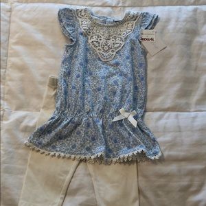 Matching Capri pants and light blue flower top